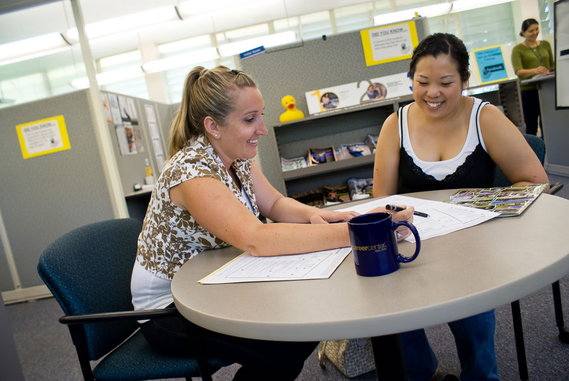 two students sitting at a desk