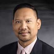 headshot of Eric Ramones