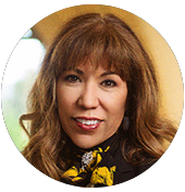 A woman wearing a black and yellow scarf.